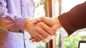 two-business-men-shaking-hands (1)